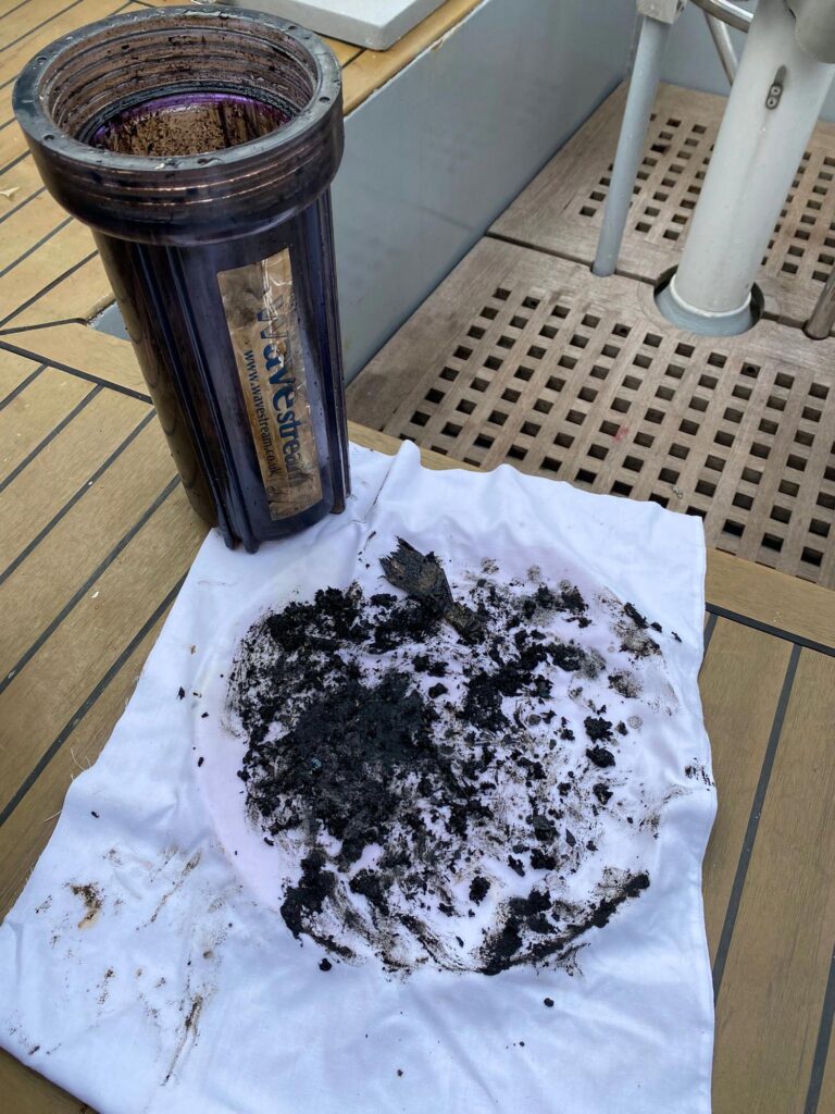 Oily waste captured in filter